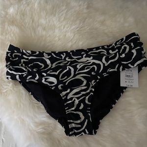 NEW! W/ tags and liner. Time and Tru swimsuit bottom size L 12-14. Black / white